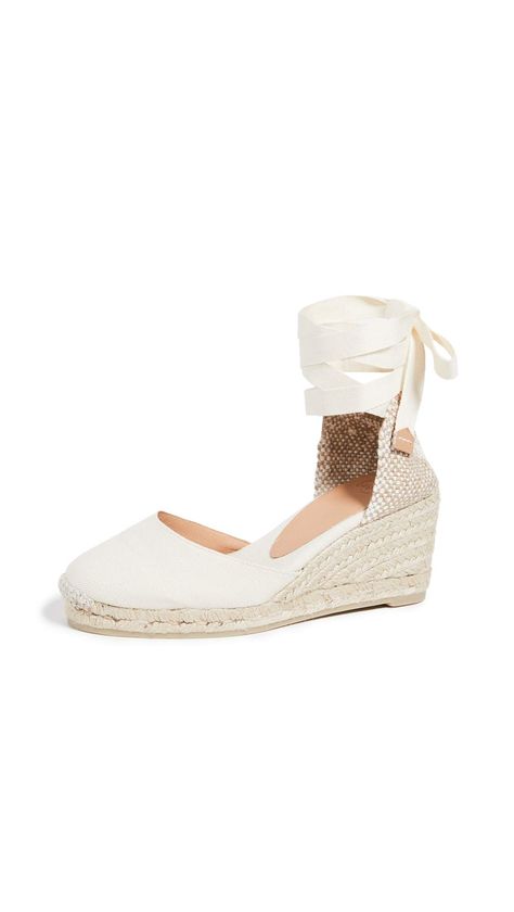 PRICES MAY VARY. Fabric: Canvas Rubber sole Braided jute wedge, Woven heel cap Heel: 3in / 75mm, Platform: 0.75in / 18mm Tie at ankle Everyone's favorite for versatile summertime sandals. These Castaner espadrilles are ready for any dress-up or dress-down occasion with a neutral hue and walkable wedge. Castaner Carina, Spring Wedges, Castaner Espadrilles, Women's Espadrilles, Wedge Espadrilles, Fabric Canvas, Heel Caps, Espadrille Sandals, Espadrille Shoes