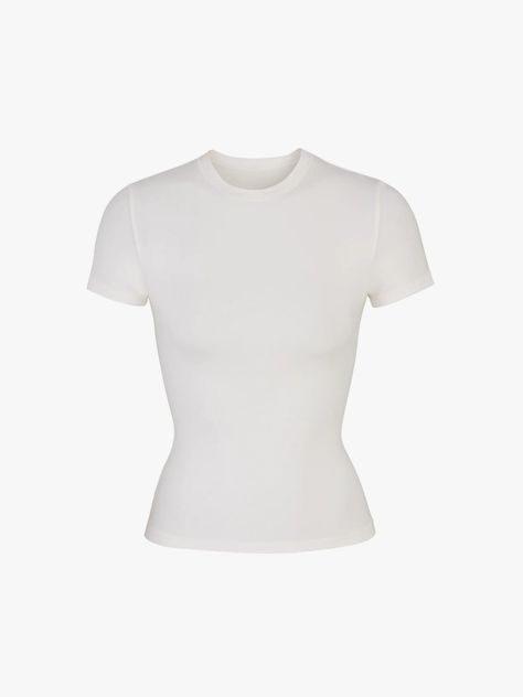 The 36 Best White T-shirts for Women, According to “Vogue” Editors | Vogue Skims Smoothing Tshirt, Skims Basic Tee, Skims Soft Smoothing T Shirt, Skims Tee Shirt, Basic White Shirt, Light Yoga, Expect Nothing, Dr Shoes, Mode Ootd