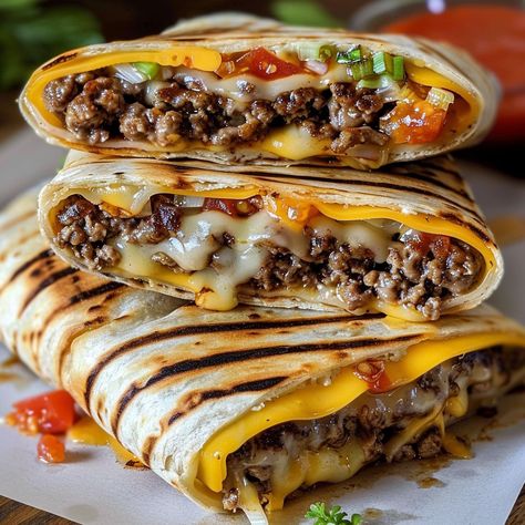 Looking for a delicious twist on a classic cheeseburger? Try these Grilled Cheeseburger Wraps! They combine all your favorite burger flavors in a convenient, handheld wrap. Perfect for a quick dinner or a fun meal ... READ MORE Weight Watchers Grilled Cheeseburger Wraps, Supper Wrap Ideas, Grilled Cheese Burger Wraps, Dinner Ideas Yummy, Cheeseburger Wraps Healthy, Weekend Grilling Dinner Ideas, Burger In Tortilla, Quick Grilling Ideas, Quick Fun Dinner Ideas