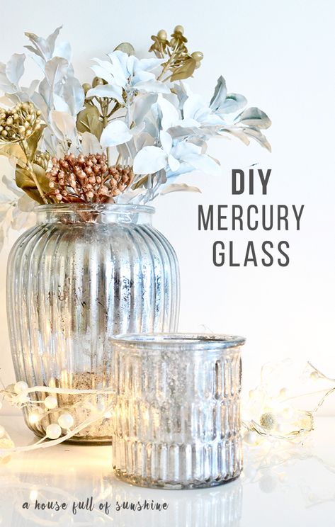 I've always admired the look of mercury glass - that slightly antiqued, mottled, silvery finish like an old mirror. This post has been underwritten by Flowers For Everyone flower delivery Perth. Nothing says Christmas like shiny metallics. Real silver is beautiful, but of course it's hugely expensive, not to mention time-consuming to maintain. And fake metallics can look tacky. Mercury glass, on the other hand, looks timeless and elegant, and you can DIY your own faux version for super cheap. He Mercury Glass Vases, Wedding Decorations Diy Centerpiece, Christmas Table Centrepiece, Mercury Glass Diy, Mercury Glass Vase, Mercury Glass Christmas, Christmas Table Centerpieces, Vase Crafts, Navidad Diy