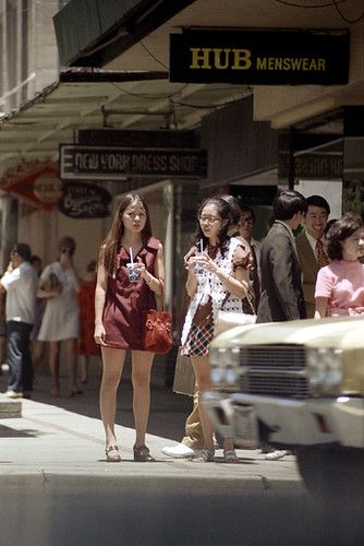 29-614 | honolulu, hawaii may 1972 candid street photography… | Flickr 70s Street Photography, Candid Street Photography, Reference Things, Candid Photoshoot, Woman Looking Down, 1970 Style, Street Photography People, Candid Pictures, City Streets Photography