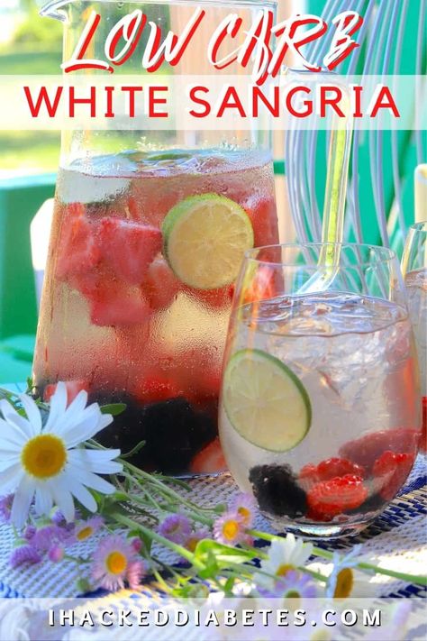 Looking for a refreshing and guilt-free drink? Our Low Carb White Sangria Recipe is the perfect choice! Made with dry white wine, fresh fruit, and a low-carb sweetener, this sangria is perfect for sipping on a hot summer day. It's easy to make and low in carbs, making it a great choice for anyone who wants to enjoy a delicious drink without the guilt. Pin it now and enjoy the refreshing taste of this amazing recipe! Keto Friendly Sangria, Low Carb Punch Alcohol, Low Calorie Sangria Recipes, Keto Sangria Low Carb, Sugar Free Cocktails Alcohol, Dry White Wine Sangria, Low Carb Sangria, Light Summer Drinks Alcohol, Low Sugar Summer Cocktails