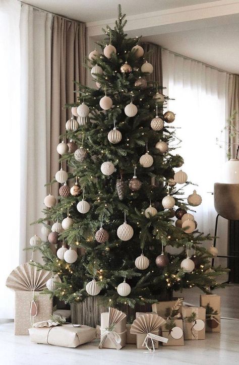 Elevate your holiday spirit by decorating your Christmas tree with love and joy, turning your home into a festive haven of warmth and celebration. #christmastree #christmastreeidea #christmasdecorideas #christmastreethemes #christmastreedecorideas #christmastreeideas2023 #christmastreedecorations Christmas Decor Modern House, Modern Tree Decor, Christmas Inspo 2024, Christmas Tree Inspo 2024, Christmas Decor Ideas 2024, Christmas Tree Ideas 2024, Classic Christmas Tree Decor, Modern Christmas Tree Decor, Modern Christmas Tree Ideas