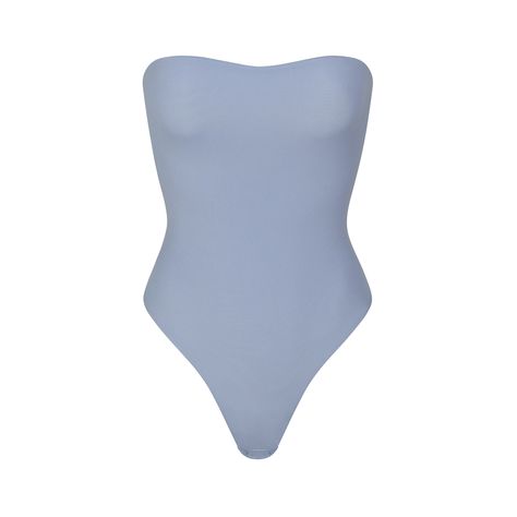 This double layered strapless thong bodysuit in our buttery-soft fabric is an essential addition to every closet. Inner elastic at the top helps keep it in place all day, while optional bra straps keep it versatile. Features a flattering high cut leg opening and a cotton gusset with snaps for ease. Fits true to size. | SKIMS Strapless Bodysuit | Blue | 4XL | Fits Everybody Strapless Bodysuit, Clean Girl, Bra Straps, High Cut, Shapewear, Soft Fabric, Double Layer, Soft Fabrics, The Top