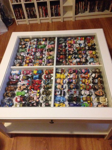 My first DIY project I actually completed. A shadow box coffee table filled with Disney Vinylmations! Great way to store and show them off. Shadow Box Table Ideas, Coffee Table Display Case, Medal Board, Diy Shadow Box Ideas, Magnet Display, Shadow Box Table, Shadow Box Coffee Table, Glass Shadow, Centre Table Design