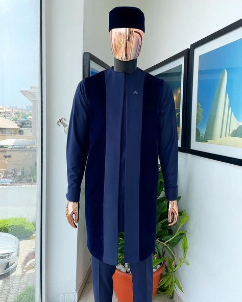 A midnight blue long sleeve kaftan, matching soaked Italian velvet kimono jacket, hat and sokoto African traditional senator kaftan native. What you get: Kaftan men’s top Pant trousers Kimono top Available in any color. Price: available on website To order: iMessage, Text or WhatsApp : +2348179435662 +2348179435663 Email: info@dejiandkola.com Website: dejiandkola.com Men Traditional Wear Nigerian, Male Native Wears, Kaftan Styles For Men, Mens Kimono Shirt, Imessage Text, Native Outfits, Kaftan For Men, Men Kaftan, Dashiki For Men