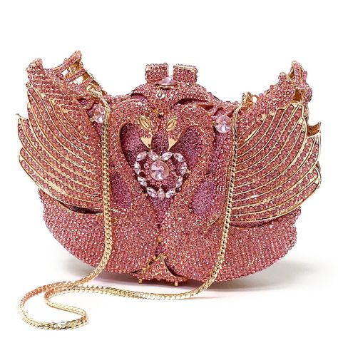 These Lovebirds evening handbag is a marvelous art, perfectly covered in brilliant pink crystals. This stunning bag is complete with gold color hardware and removable gold snap hook chain. This marvelous soulmate art bag can be carry in hand with or without chain. Glamorous and functional, this clutch can hold securely your keys, cards, cash and other small necessities.   Details: Measurement: 7.5in length x 5in high x 2in width Color: Pink crystals Lining: golden vegan leather Closure: magnetic Soulmate Art, Formal Evening Wear, Cute Purse, Girly Bags, Luxury Purses, Art Bag, Fancy Bags, Evening Handbag, Pretty Bags