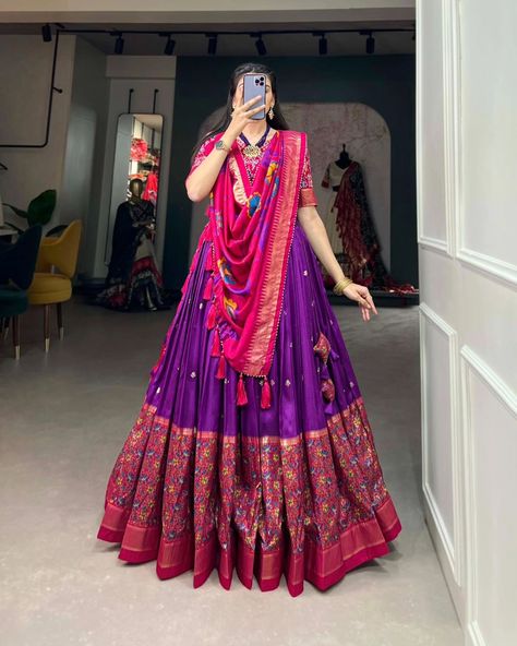 Rate : 1500 #apex__outfit Drape yourself in the elegance of Tussar Silk Lehenga, where print tells a story of timeless beauty and sophistication🌷 Lehenga(Stitched) : Lehenga Fabric : Tussar Silk Lehenga Work : Print With Foil Work Lehenga Waist : SUPPORTED UP TO 42 Lehenga Closer : Drawstring With Heavy Tassels and Zip Stitching : Stitched With Canvas and attached with Can Can Length : 42 Flair : 3.80 Meter Inner : Micro Cotton Blouse(Unstitched) : Blouse fabric : Tussar Silk Blouse Work... Pink Purple Lehenga, Tassels Design For Lehenga, Dress Illustration Design, Purple Lehenga, Lehenga Crop Top, Choli Dress, Purple Foil, Lehenga Choli Wedding, Indian Wedding Outfit