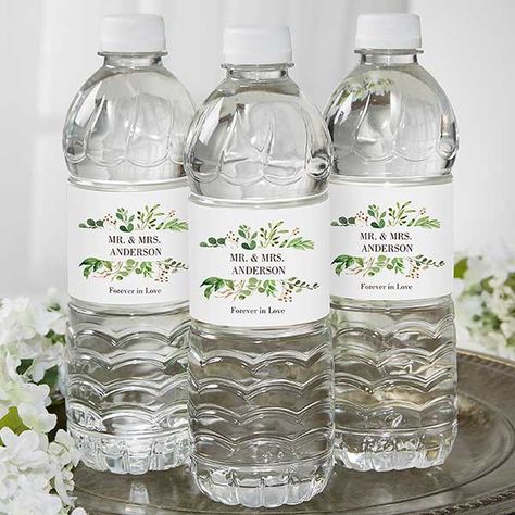 Personalize with up to two lines of text within the greenery designAdd any date or a single line of text below the design Sold in sets of 24Labels are self-adhesive and waterproofLabels measure 8 1/2" x 2"Fits most standard 12 oz. and 16.9 oz. water bottles. Labels can be trimmed to fit smaller bottlesAssembly required, just peel and stick to water bottlesPlease note: water bottles are not includedMade in the USA Our Laurels of Love Personalized Water Bottle Labels add a special touch to your br Water Bottles Labels, Mason Jar Candle Favors, Personalized Water Bottle Labels Wedding, Wedding Water Bottle Labels, Custom Water Bottle Labels, Personalized Candy Bar Wrapper, Personalized Candy Bars, Personalized Water Bottle Labels, Wedding Water