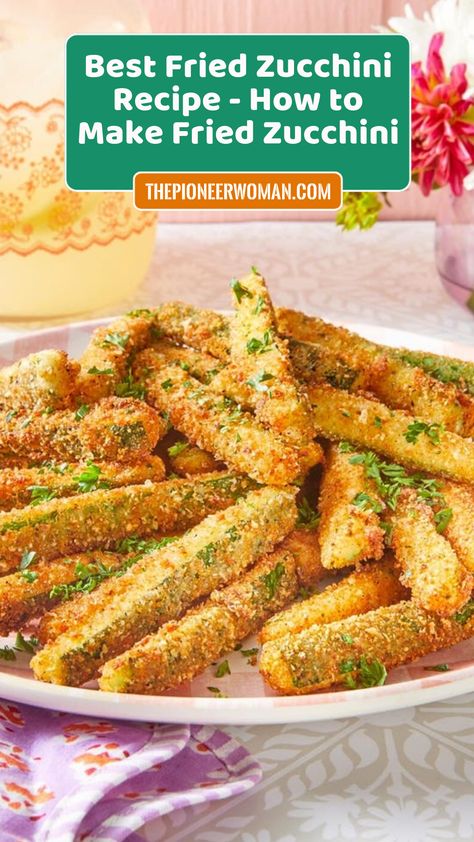 Transform summer zucchini into a crunchy snack recipe by coating it in breadcrumbs and parmesan, and frying it until golden brown and perfectly crisp. Fried Zucchini Recipe Easy, Zucchini Fried, Fried Zucchini Recipe, Fried Zucchini Flowers, Fried Zucchini Recipes, Zucchini Crisps, Easy Zucchini Recipes, Fried Zucchini, Summer Zucchini