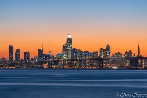 This is an original color photograph of a bit of the San Francisco skyline, as seen from Middle Harbor Shoreline Park, in the Port of Oakland. This was an unusually clear evening to photograph the setting sun from across the Bay, and I was rewarded with these amazing twilight colors. The Bay Bridge spans the foreground, while the new Salesforce tower dominates the skyline at center. This photograph is available as a paper photographic print with a standard finish, or as an aluminum metal print with a glossy finish.  If you are interested in other papers or finishes, please message me for a custom quote.  I'll be happy to help! Paper photographs are professionally printed on Kodak Endura paper, with a standard finish and a lustre coating that protects the image from fingerprints and UV dama Aluminum Sheets, Setting Sun, Colour Photograph, Philadelphia Pa, Bay Bridge, Color Photography, Aluminum Metal, San Francisco Skyline, Photographic Print