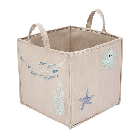 Keep your baby's nursery organized and stylish with the Crane Baby Ocean Animal Nursery Storage Bin. This charming and practical storage solution is designed with delightful sea creature embroidery, including a friendly octopus, a playful starfish, and a school of fish, adding a touch of whimsy to any room. The neutral beige fabric complements any nursery décor, making it a versatile addition to your baby's space. Friendly Octopus, Ocean Baby Rooms, Ocean Animal Nursery, Baby Humidifier, Nursery Room Rugs, Nursery Decor Pillows, Ocean Themed Nursery, Baby Nursery Organization, Nursery Canopy