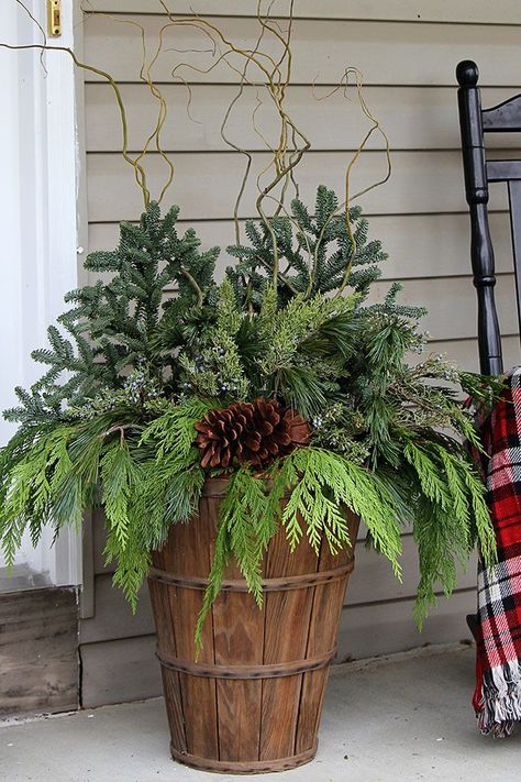 25 Best Winter Porch Decorating Ideas - Outdoor Winter Porch Decor Winter Porch Pots, Winter Porch Decorations, Julkransar Diy, Natal Natural, Porch Pots, Outdoor Christmas Planters, Christmas Urns, Holiday Planter, Winter Planter