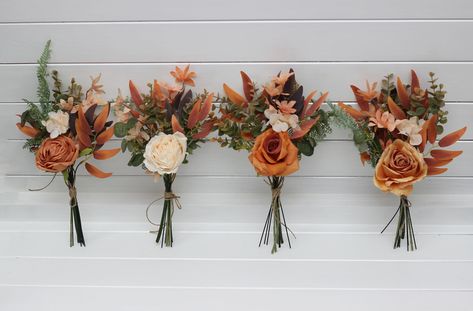 "The bouquets are created from artificial flowers and greenery of high quality. All dimensions are total length or width. The width - 5\"( 13 cm) The height - 11\" ( 28cm) Flowers for the arch are here: https://www.etsy.com/listing/1107692186/terracotta-cream-arch-arrangement-arch?click_key=c4f68aae89968f17c14bffea5b668ea271d75c8c%3A1107692186&click_sum=87056110&ref=shop_home_active_36&frs=1&crt=1&sts=1 The bouquet is here:  https://www.etsy.com/listing/1121635853/boho-bouquet-pampass-grass-oran Terracotta Rust Bouquet, Terracotta Bouquet Bridesmaid, Bridesmaid Bouquet Terracotta, Small Fall Bouquet, Rust Wedding Decor, Fall Bridesmaid Bouquet, Terracotta Wedding Flowers, Terracotta Wedding Bouquet, Wedding Table Flower Centerpieces