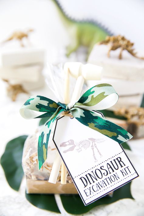 Dinosaur Dig Excavation Kits - A Pumpkin And A Princess Dinosaur Themed Birthday Party Centerpiece, Dinosaur Excavation Kit Diy, Diy Dinosaur Party Favors, Dino Excavation Kit Diy, Boho Three Rex Party, Dinosaur Favors Ideas, Dinosaur Toddler Birthday Party, Boho Dinosaur Party, Dinosaur Excavation Kit