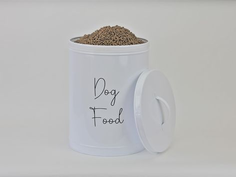 PRICES MAY VARY. Large- 20" tall, 15" diameter. Holds up to 40lbs of food. Features a silicone-lined lid that will keep your pets' kibble fresh and dry! Canister style holder will look good in your home but also keep your dog's food accessible. A comfortable handle and ergonomic design serve as the perfect counter decor and storage space! This container has a minimalist design and is a decorative and functional piece that will look fantastic in your kitchen, entryway, or wherever you like to ser Dog Food Holder, Dog Treat Storage, Dog Food Storage Containers, Counter Decor, Dog Food Storage, Kitchen Entryway, Ceiling Fan In Kitchen, Dog Treat, Functional Storage