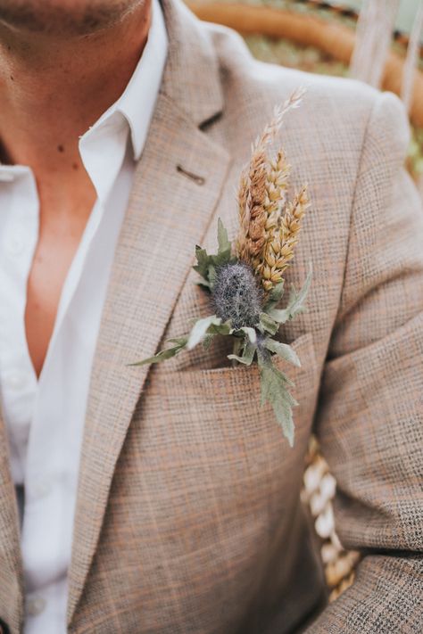 Buttonhole Groom Flowers Wheat Grass Naked Tipi Wedding Ideas Holly Rose Stones #Buttonhole #Groom #Flowers #Wheat #Grass #Wedding Bohemian Suit Wedding, Groom Attire Outdoor Wedding, Groom Suit Flower, Wedding Groom Ideas, Stone Suit Wedding, Whimsical Wedding Groom, Stone Wedding Suit, Whimsical Groom Attire, Tipi Wedding Flowers