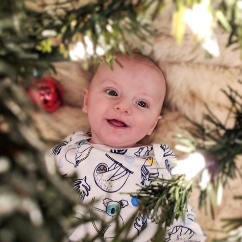 Baby By Christmas Tree Photo, Under The Christmas Tree Photography, Christmas Tree Baby Photoshoot, 12 Month Christmas Pictures, Baby Milestone Christmas Pictures, Christmas Photos 6 Month Old, Newborn By Christmas Tree, Baby Pictures In Front Of Christmas Tree, Infant Christmas Tree Pictures