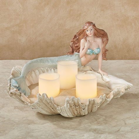 PRICES MAY VARY. This item is our exclusive! Coastal decorative bowl Features a lovely mermaid Shimmering powder blue tail Lounging along this decorative bowl, the beautiful Mermaid thinks of her love upon the shore. Crafted from resin, this charming bowl features a natural-, cream-, and tan-toned scallop shell and a lovely mermaid with a shimmering powder blue tail. The shell can hold your decorative accents or sea treasures; sand and candles are not included. Decorative use only. Mermaid bowl Mermaid Bowl, Giant Clam Shell, Mermaid Soap, Mermaid Bathroom, Blue Tail, Mermaid Figurine, Nautical Crafts, Mermaid Pattern, Shell Collection