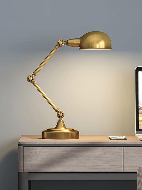 Shine a light on the task at hand with this adjustable table lamp, a must-have for any office desk or workspace. Beyond practical, this lamp's Metal Gold finish gives it a vintage industrial look. 
 
 Product Size 
 Size: Dia 18cm x H 63cm / ∅ 7.08″ x H 24.8″ 
 
 Details 
 
 Material: Metal, Iron, Aluminum alloy, 
 Light source base type: E26 or E27 (as shown below) 
                             
 Power: Shine A Light, Industrial Vintage, Adjustable Table, Adjustable Lighting, Table Light, Desk Light, Edison Bulb, Styl Vintage, Edison Light Bulbs