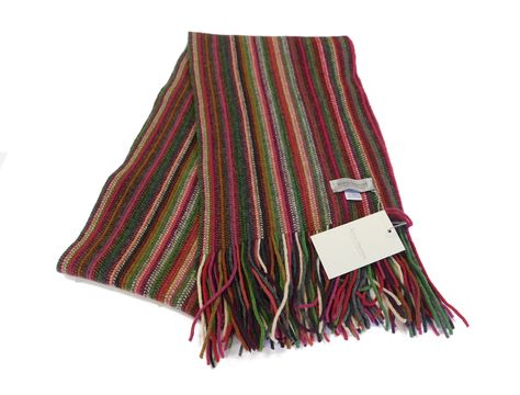 LAMBSWOOL MULTI-STRIPED SCARF Pure Lambswool warp-knitted in a multi-coloured stripe combining various Reds and Greens shades.  Knitted using 2/17Nm Lambswool Yarn making a nice medium weight scarf. Size approx 60 by 9 inches (150 x 23cm) not including tasstles 100% Lambswool Made in Hawick, Scotland Size approx 60 inches by 9 inches Hand Wash recommended Hawick has been the home of world class knitwear since the 1800s. Striped Knitted Scarf, Green And Red Outfit, Stripey Scarf, Big Pants Small Shirt, Stripe Scarf Knit, Aesthetic Scarf, Hawick Scotland, Scarf Aesthetic, Male Accessories