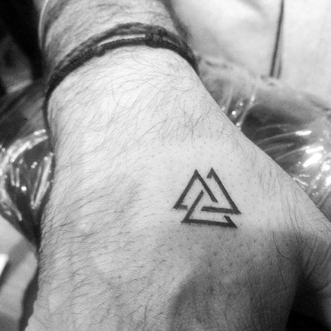 Triangles Norse Male Tattoo With Simple Hand Design Punisher Tattoo, Tattoo Odin, Meaningful Tattoos For Men, Simple Hand Tattoos, Tatuagem Masculina Pequena, Simple Tattoos For Guys, Small Tattoos With Meaning, Tattoo Inspiration Men, Simple Tattoo Designs