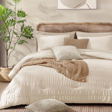 PRICES MAY VARY. Exquisite Design: This Seersucker king comforter set features a fluffy and unique puckered texture design, with stripes of varying widths presenting an elegant appearance, creating a sophisticated 3D wavy visual effect, adding a fashionable, exquisite and romantic atmosphere to your room Soft & Breathable: Crafted from 100% premium microfiber, our king bedding sets are durable, hypoallergenic, and breathable. The 240 GSM soft microfiber filling offers the perfect warmth and comf King Size Comforters Master Bedrooms, Beige King Bedding, Boho Bed Comforters, Cream Bedframe Room Decor, Cal King Bedding Ideas, King Bed Bedding Ideas, California King Bedding Ideas, Tan Bedspread Ideas, Neutral Comforter Sets