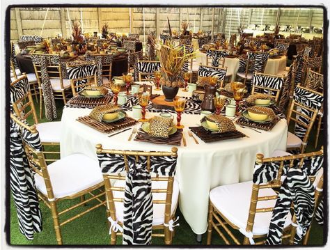 Traditional african wedding decor. Zulu wedding. Wedding ideas. Wedding centerpieces. Luxurious animal prints. Hand painted jugs. Tiffany chair tie backs. Lounge furniture. www.secundatents.com Zulu Traditional Wedding Decor, Traditional African Wedding Decor, African Wedding Decor, Painted Jugs, Xhosa Wedding, Zulu Traditional Wedding, Animal Print Wedding, African Wedding Theme, Traditional African Wedding