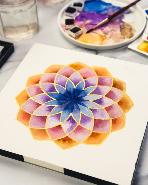 A watercolour painting of a mandala in blue, purple and gold, on a block, with the messy paint palette in the background. Watercolour Geometric Pattern, Geometric Watercolor Art, Watercolour Mandala, Watercolour Geometric, Geometric Circle Pattern, Colour Fields, Field Paint, Watercolor Mandala, Ogee Pattern