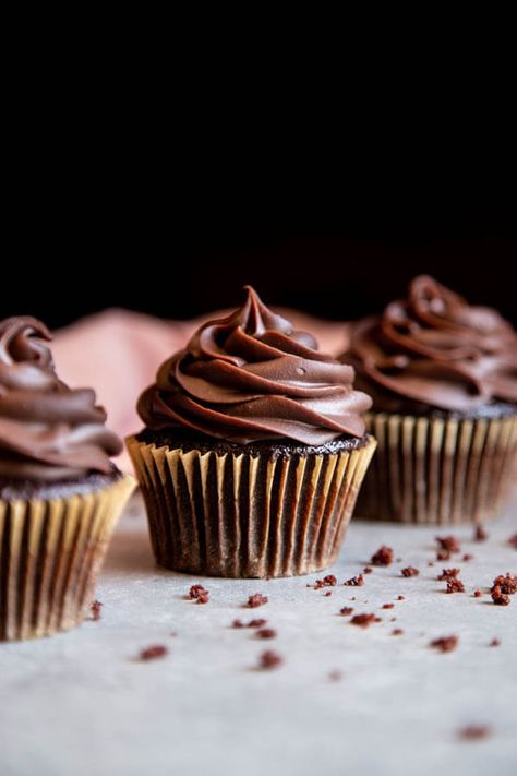 Soft and fluffy Chocolate Cupcakes topped with a 2-ingredient chocolate ganache frosting are super simple to make. This recipe yields the moistest and tastiest chocolate cupcakes you will ever need in your life! #wildwildwhisk #chocolatecupcakes Fluffy Chocolate Cupcakes, Chocolate Ganache Cupcakes, Fudge Cupcakes, Triple Chocolate Muffins, Chocolate Fudge Cupcakes, Chocolate Buttercream Recipe, Cupcake Photography, Chocolate Cupcakes Moist, Chocolate Ganache Filling