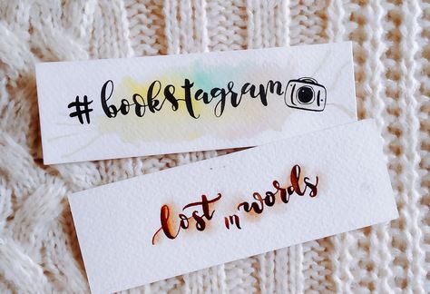 Calligraphy Bookmark Ideas -  for bookstagram and bookstagrammers - Hand painted and hand lettered watercolor bookmark with glitters Handmade Bookmark Ideas Quotes, Watercolor Bookmarks Quotes, Bookmarks Handmade Quotes, Bookmark Ideas Quotes, Bookmark Calligraphy, Bookmark Ideas Creative, Bookmarks Calligraphy, Calligraphy Bookmarks, Bookmarks With Quotes