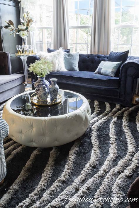 I love this round white leather coffee table with the black top. It goes with the black and silver area rug perfectly! Click through to find more glam decor ideas for your home interiors. #fromhousetohome #homedecorideas #decoratingtips #glamdecor #housedecoronabudget Glam Decor On A Budget, Glam Decor Ideas, Hollywood Glam Decor, Glamour Interiors, Leather Coffee Table, Glamour Home, Glamorous Interiors, Glamorous Decor, Glamour Decor