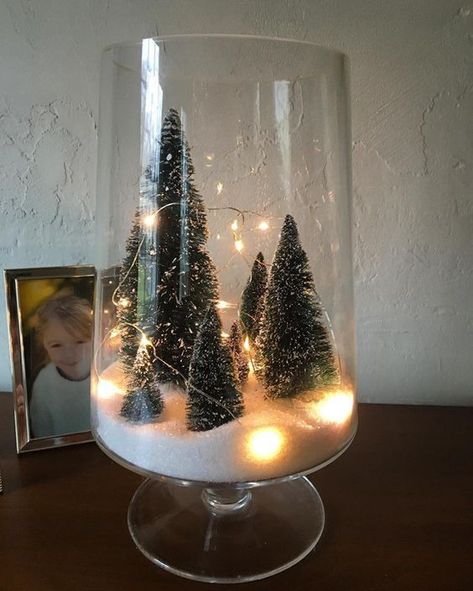 a tall glass terrarium with faux snow, some bottle brush trees and lights is easy to make yourself and looks cool Party Lights Decoration, Silver Christmas Decorations, Cookies Christmas, Wedding Centerpieces Diy, Nails 2023, Silver Christmas, Christmas Centerpieces, Christmas Is Coming, Christmas Deco