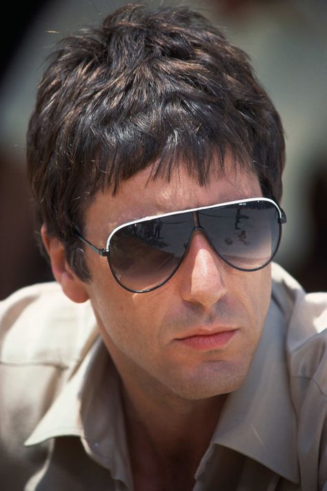 Get a look like Tony Montana from Scarface.  Similar Carrera sunglasses can complete the outfit. https://www.framesdirect.com/framesfp/Carrera-paldrap/lb.html Tony Montana, Wearing Sunglasses, Al Pacino, Montana, A Man, Sunglasses