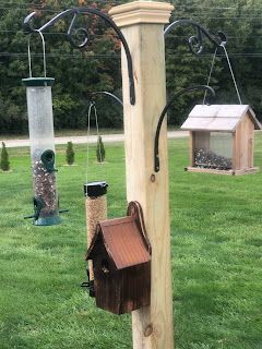 Bird Feeder Holder, Hanging Birdfeeder Ideas, Wildlife Feeders Diy, Bird Feeder Hangers Outdoor, Outside Bird Feeder Ideas, Porch Bird Feeder Ideas, Diy Standing Bird Feeder, Diy Birdfeeders Wooden, Free Standing Bird Feeders Outdoor