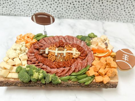 Elevate your next game day and cheer on your favorite team with this delicious CharCUTErie board. Our boards are the perfect blend of gourmet cheeses, meats, dips, veggies, fruits, and crackers. Custom dietary options are available. Available for local Chicagoland, IL pick up and delivery only. Each of our products are uniquely made by our expert charcuterists. Due to supply chain issues, some items may vary. Check out the rest of our amazing CharCUTErie Boards! Football Shaped Charcuterie Board, Tailgate Charcuterie Board, Game Day Charcuterie Board, Nfl Snacks, Football Charcuterie Board, Food Sale Ideas, Football Themed Snacks, Superbowl Ideas, Supper Bowl