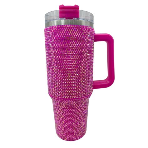 PRICES MAY VARY. Food grade stainless steel, vacuum insulated. Double walled, sweat proof. Powder coated finish. Fits in most cup holders. BPA free. Very Sparkly Durable Splash proof This rhinestone tumbler is a must-have for any party, and it's sure to impress your guests. This 40 oz tumbler is made of high-quality stainless steel, and it comes with a clear lid and straw. The double wall vacuum insulation keeps your drinks hot or cold for hours, and the rhinestones add a touch of luxury. The tu Rhinestone Tumbler, Rhinestone Cups, Custom Bling, 40 Oz Tumbler, Insulated Cups, Sweat Proof, Cup Holders, Tumblers With Lids, Insulated Tumblers