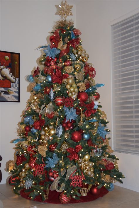 Beautiful Christmas Tree decorated in Gold, Red and light Blue with clusters made of Christmas balls. Just Beautiful and elegant 2016 - 2017 Christmas Tree Ideas Blue And Red, Red Gold Blue Christmas Tree, Blue Red Gold Christmas Tree, Red Gold And Blue Christmas Tree, Red Blue And Gold Christmas Tree, Blue Red And Gold Christmas Tree, Red Blue Gold Christmas Tree, Beautiful Christmas Trees Decorated, Girly Background