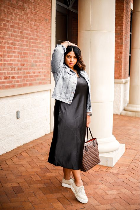 black satin midi dress with a jean jacket and platform sneakers Satin Dress Denim Jacket, Plus Size Satin Slip Dress Outfit, Satin Dress With Sweater, Satin Dress With Sneakers, Casual Satin Dress, Black Slip Dress Outfit, Satin Slip Dress Outfit, Plus Size Satin Dress, Outfits For Italy