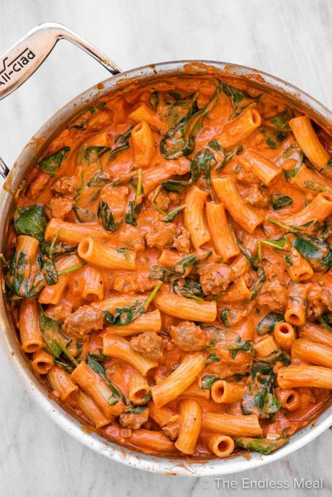 PIN TO SAVE! Creamy Italian sausage pasta is easy to make and super delicious. It's made with spicy or mild (your choice!) Italian sausage cooked in a creamy tomato sauce. You'll love it! #theendlessmeal #pasta #italiansausagepasta #sausagepasta #italianpasta #italiansausage #pastarecipes #familymeals #familyrecipes #easymeals #easyrecipes #italian #italianrecipes #sugarfree #glutenfree Meals With Spicy Italian Sausage, Sausage And Fettuccine, Spicy Creamy Tomato Pasta, Creamy Marinara Pasta, Tomato Based Pasta Recipes, Italian Sausage Pasta Recipes, Mild Italian Sausage Recipes, Creamy Sausage Rigatoni, Homemade Kielbasa