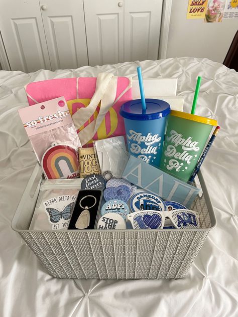 big little basket ideas adpi gifts sorority canvas Sorority Goodie Bags Gift Ideas, College Bday Gifts, Big/ Little Gifts, Bid Day Baskets Gift Ideas, Big And Lil Gift Ideas, Sorority New Member Gifts Bid Day, Big Sis Little Sis Gifts Sports, Basket Ideas Sorority, Bid Day Baskets Sorority