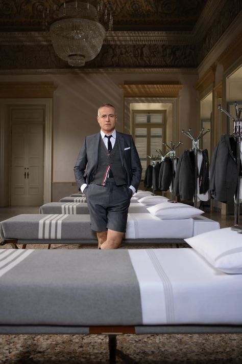 Now You Can Live Like Thom Browne, Too | GQ Posh Spice, Housewives Of New York, Simone Biles, Oxford White, People Sitting, Tiktok Style, Gray Suit, Short Suit, American Design