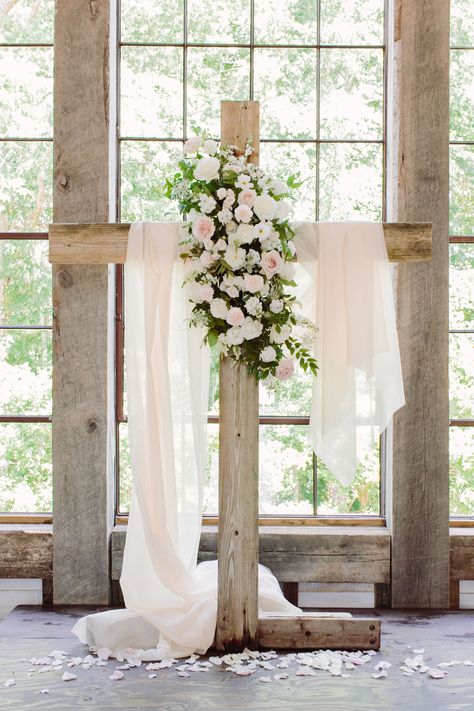 Cross Arbor Wedding Flowers, Wedding Cross With Drape, Cross Garland Wedding, Wooden Cross Wedding Decor, Pink And Wood Wedding Decor, Wooden Cross Wedding Arch, Christian Wedding Ideas Ceremony Decor, Wood Cross For Wedding, Wedding Chapel Entrance Decor