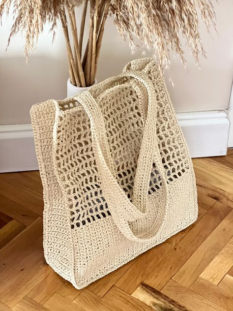 Excited to share this item from my #etsy shop: Paper Yarn Mesh Bag ,Casual Shoulder Bag, Knitted Bag, Crochet Cream Color bag,Summer Beach Bag Beach Girlie, Hand Knit Bag, Crochet Beach Bags, Paper Yarn, Beach Crochet, Knitted Bag, Mode Crochet, Yarn Bag, Crochet Clutch