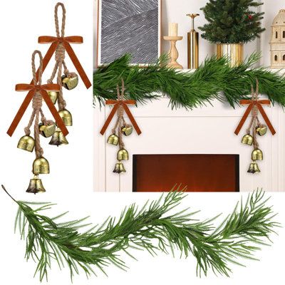 This Christmas Norfolk Pine Garland features realistic touch artificial greenery and comes adorned with two sets of cow bells on rope, making it the perfect addition to your mantle or table for holiday and winter decor. One Allium Way | One Allium Way Christmas Norfolk Pine Garland w/ Real Touch Greenery and 2 Sets of Cow Bells on Rope, Metal;Polyethylene (PE) | C112073293 | Wayfair Canada Wreath With Cow Bells, Norfolk Pine Garland, Rope Making, Norfolk Pine, Pine Garland, Artificial Greenery, Pillows Flowers, Cow Bell, Outdoor Grill