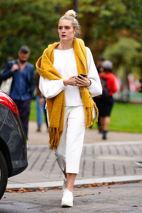 This Is the 1 Color Everyone Will Be Wearing Next Spring Yellow Scarf Outfit Winter, Yellow Scarf Outfit, White Scarf Outfit, Scarf Outfit Winter, Mustard Scarf, Wearing Scarves, Bright Scarf, Elegante Y Chic, Ways To Wear A Scarf