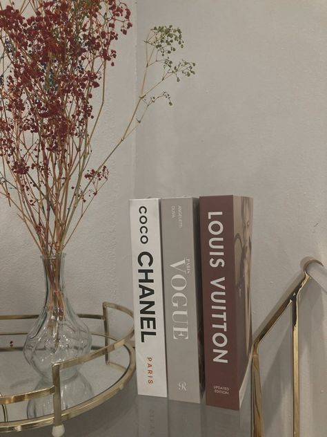 Chanel Dior Book Decor, Vogue Book Decor, Coco Chanel Book Decor, Vogue Books Aesthetic, Designer Aesthetic Bedroom Decor, Bedroom Ideas Chanel, Designer Book Aesthetic, Fashion Books Decor Aesthetic, Designer Aesthetic Room Decor