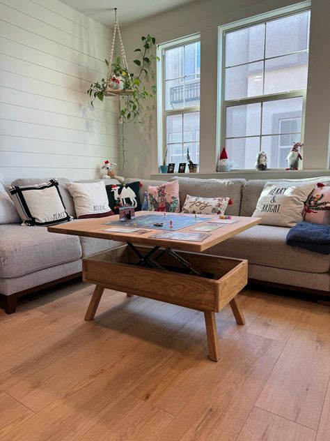 Part of our mid-century modern collection, this lift top coffee table turns into a small dining table. Top lifts vertically at many preset steps and then swings and opens into a double top surface totaling 36" x 36". Show in White Oak, it is beautiful and solidly built. It's heavy as well. *When ordering, please view the Ordering Guide picture for info. We can modify the sizes to fit your specific couch or use, so please send us a message and we' Couples Gaming Room, Couples Gaming, Pop Up Table, Scandinavian Living Room Ideas, Minimal Apartment, Upstairs Living Room, Tv Area, Living Room Blue, Kitchen Green