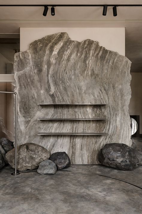 balbek bureau evokes extraterrestrial lands at milla nova store in warsaw Roly Poly Chair, Marble House, A Space Odyssey, Milla Nova, 2001 A Space Odyssey, Bridal Store, Stone Panels, Brick Architecture, Bridal Elegance