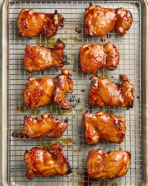 overhead shot of filipino barbecue chicken on a cooling rack, in a sheet pan Filipino Chicken Barbecue Recipe, Filipino Barbecue, Filipino Bbq, Bbq Chicken Marinade, Fowl Recipes, Barbecue Chicken Recipe, Making Chicken, Chicken Bbq, Chop Recipes